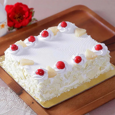 "Square shape Pineapple Eggless Cake - 1 Kg - Click here to View more details about this Product